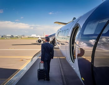 Firefly executive boarding a plane to india from london 45068